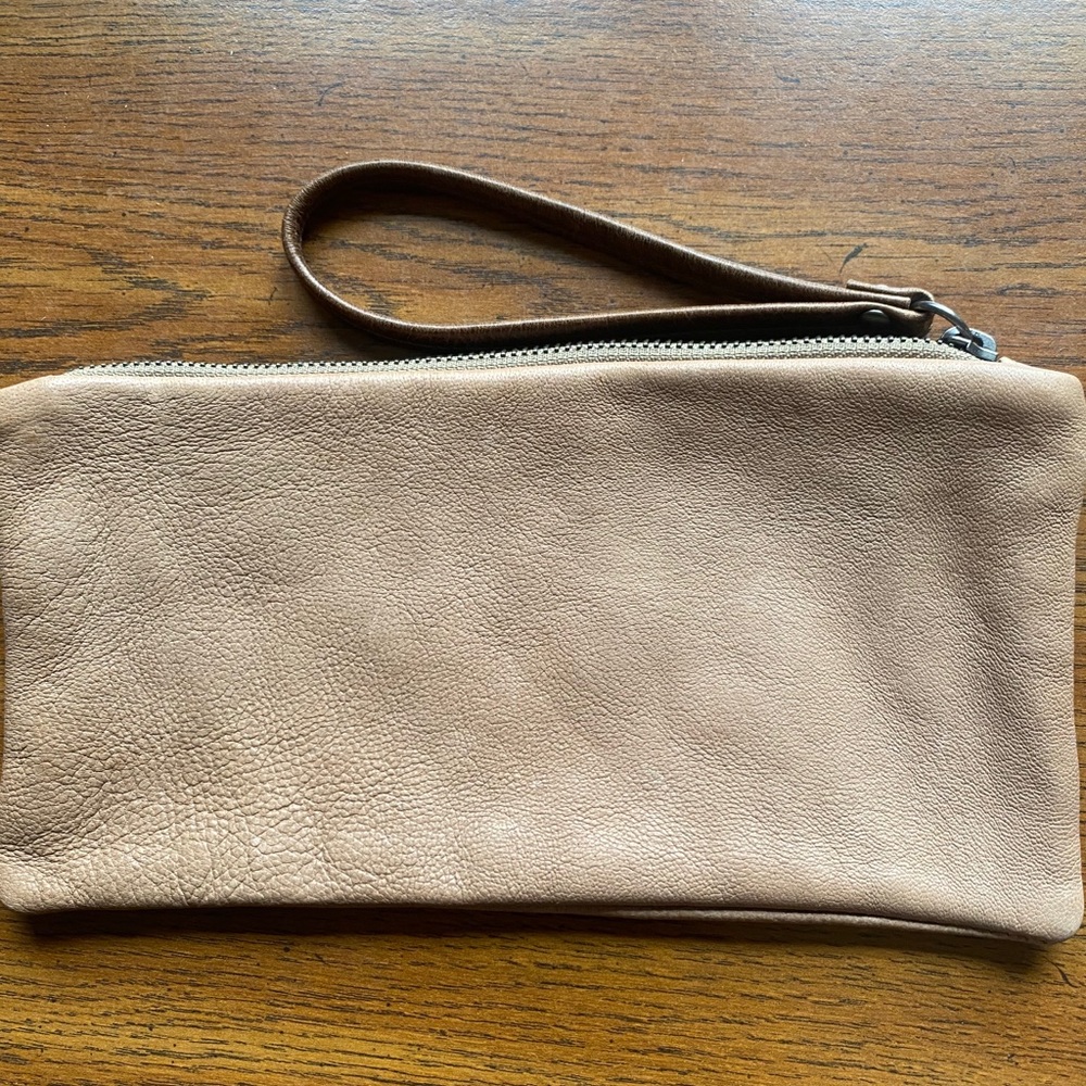 Rough and tumble leather clutch